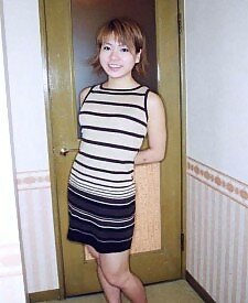 Shy Japanese shows her tight pussy